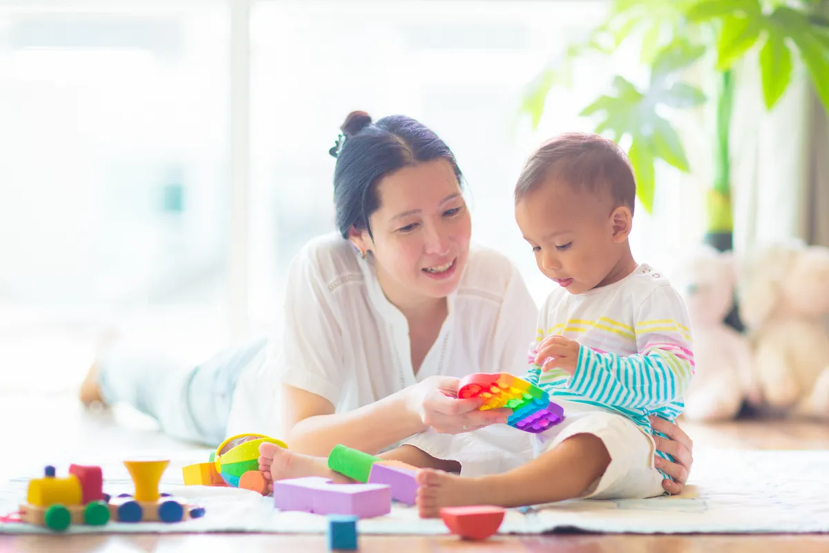 A nanny caring for a child